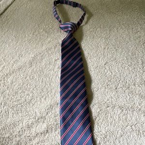 Kids adjustable neck tie. Blue and red striped.